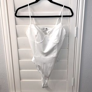 Super cute white bodysuit, never worn!!